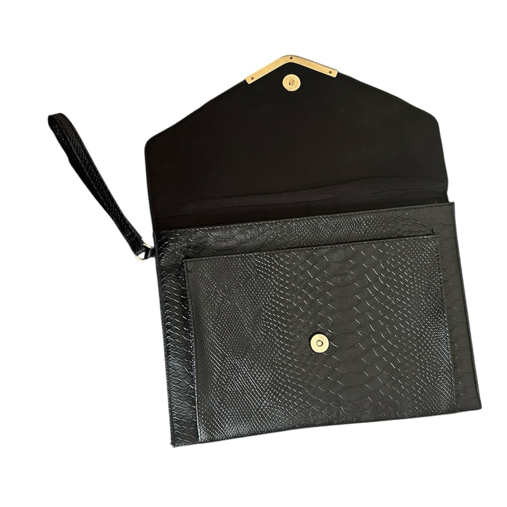 Atmosphere black clutch handbag used in excellent condition